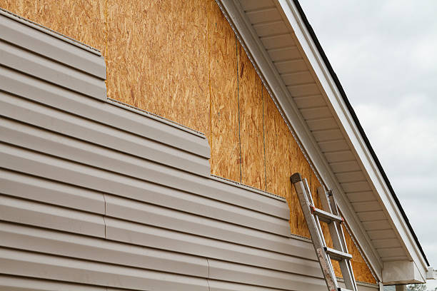 Professional Vinyl Siding technician working in Blue Rock, OH
